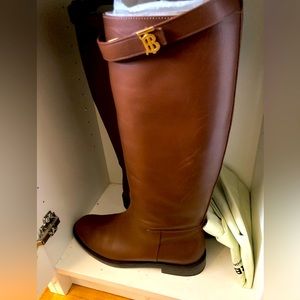 Burberry flat knee high boots. Slightly used (only once) sells for $1390